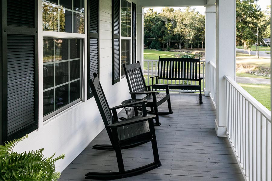 Brentwood, TN Insurance - View of a Front Porch with Black Rocking Chairs